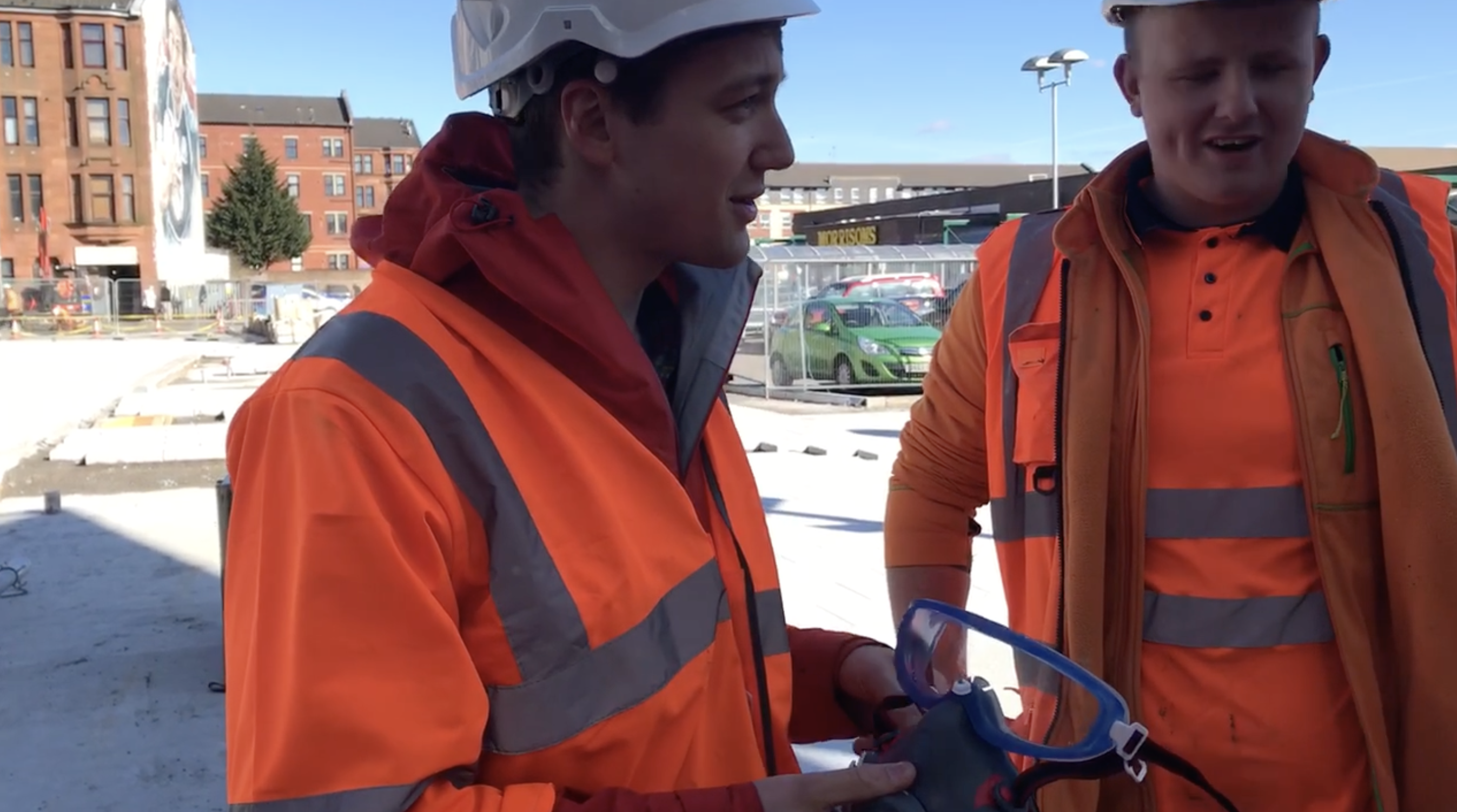 Research on site with construction workers